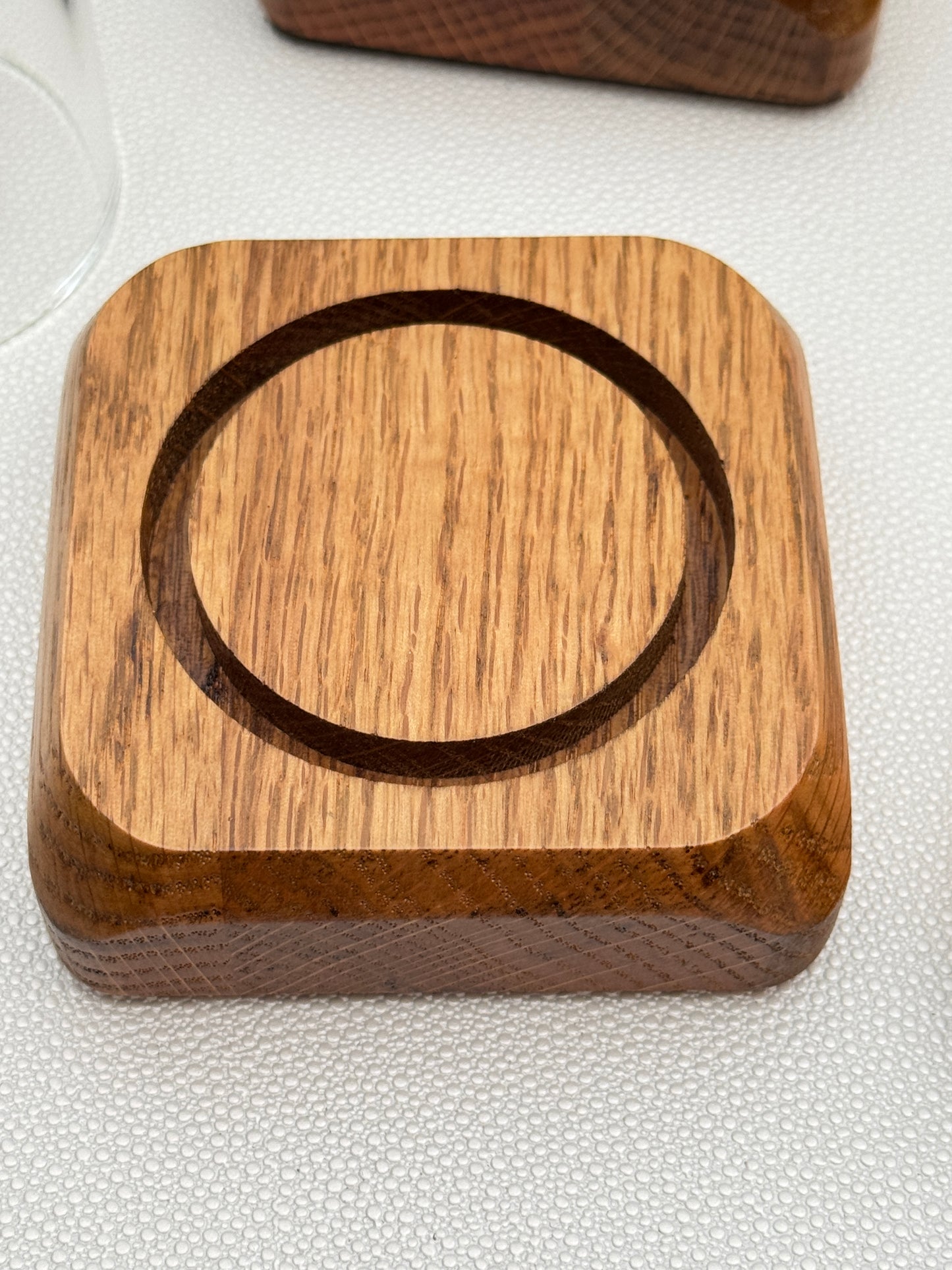 Four small Oak Displays with glass domes