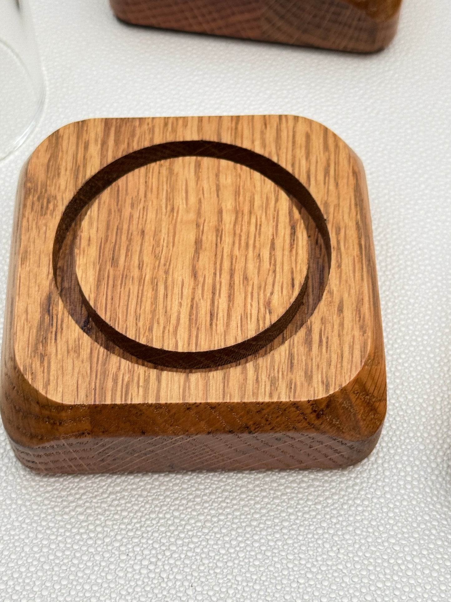 Four small Oak Displays with glass domes